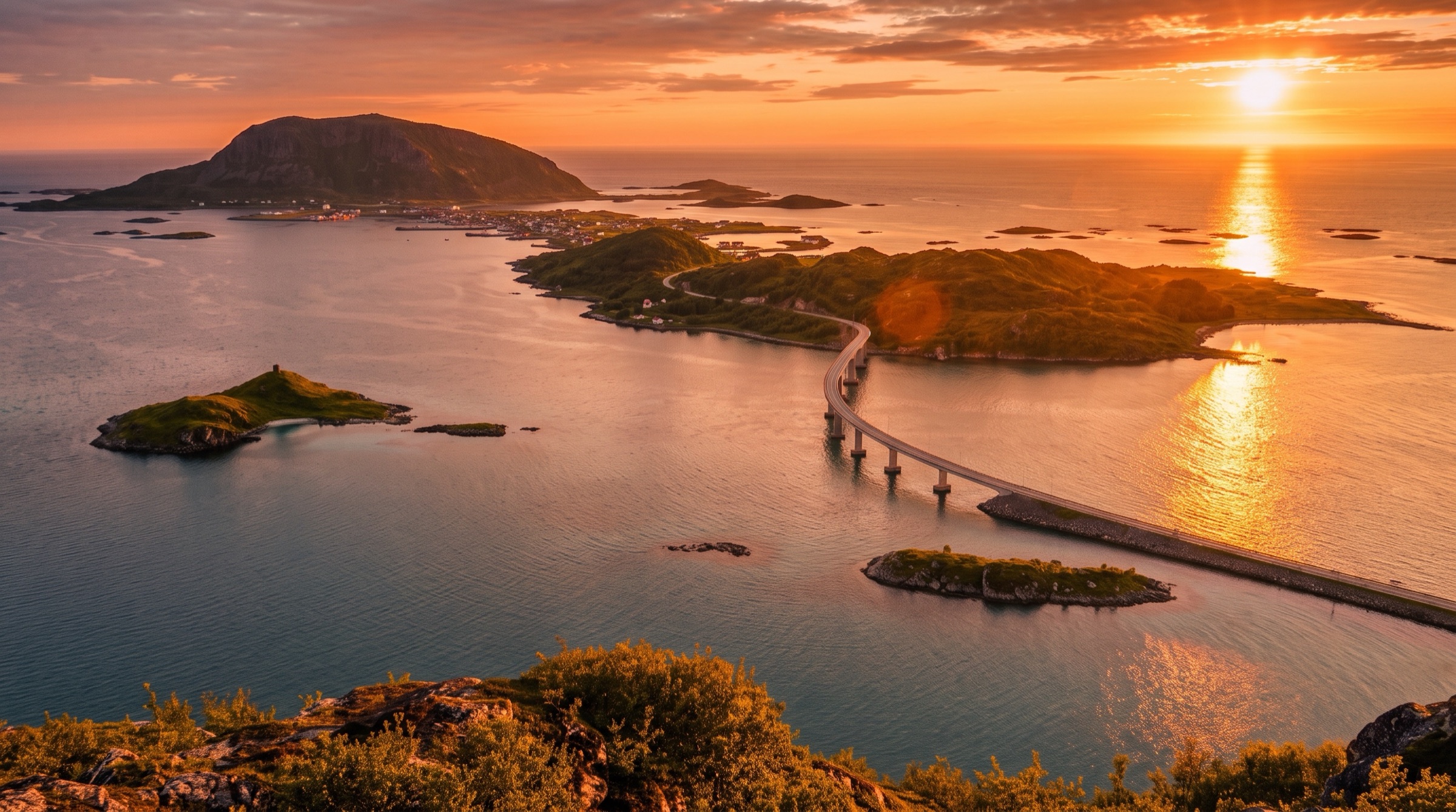 Midnight sun over Sommarøy and the bridge to the islands near Tromsø